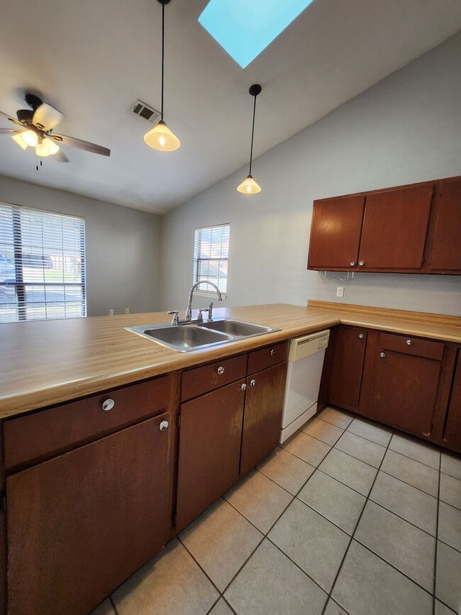 Building Photo - Updated 2 bedroom duplex with all wood flo...