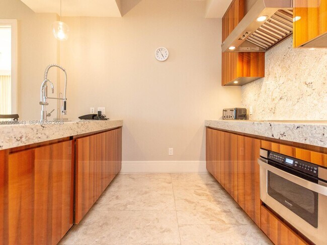 Building Photo - 9705 Collins Ave