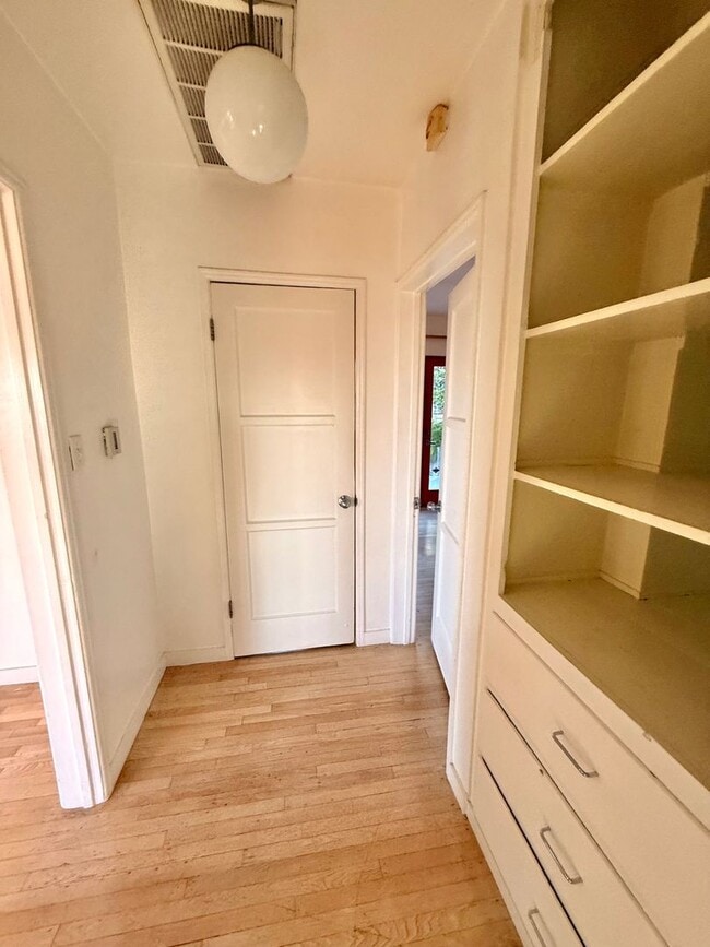 Building Photo - Hilltop Highland Park Sanctuary with Views, Private Gated Yard, In Unit Laundry, Parking & Abunda...