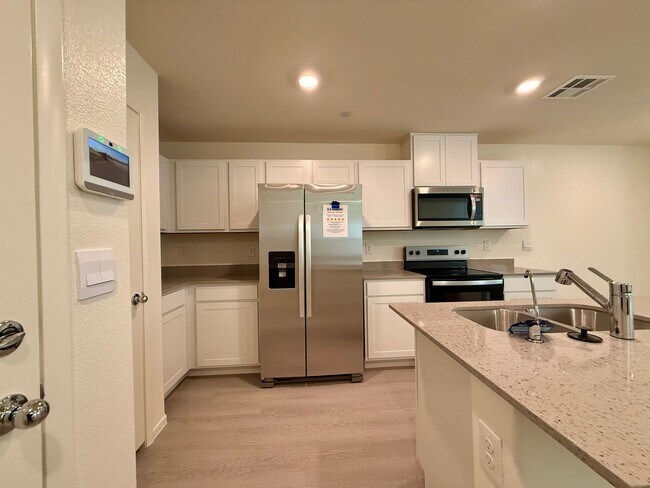 Building Photo - BRAND NEW 3 BED 2.5 BATH 2 CAR GARAGE TOWNHOUSE W/ LOFT FOR RENT!!!