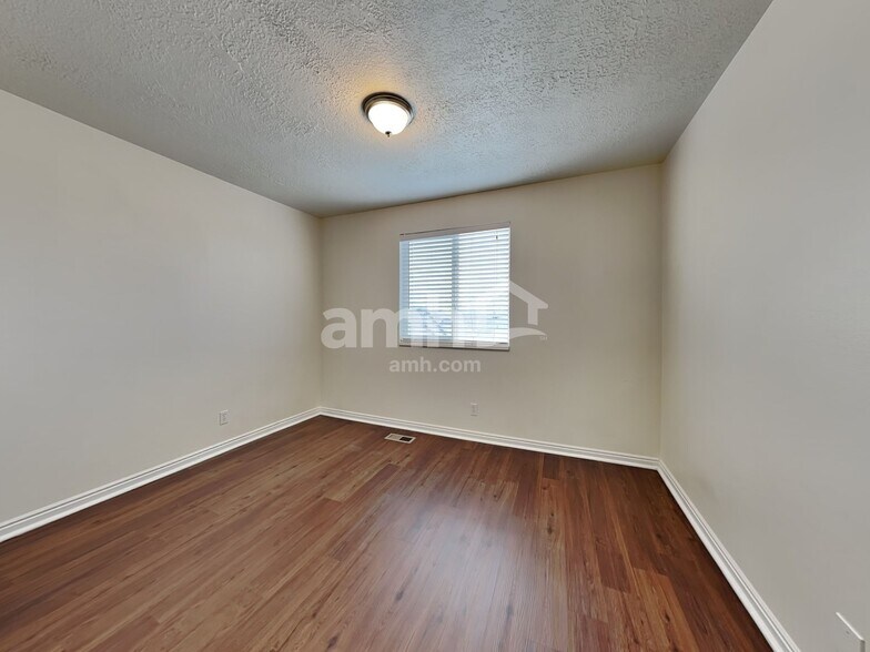 Building Photo - 5697 S Stone Flower Way