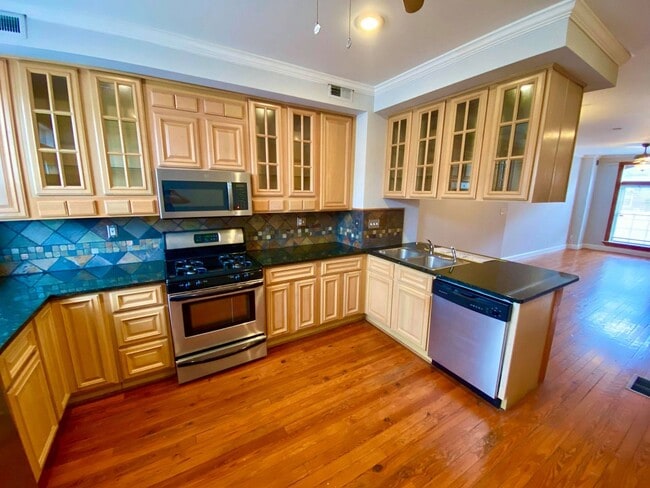Building Photo - Exceptional 2bed/3ba Patterson Park Home - Large Rear Deck & Parking Pad!