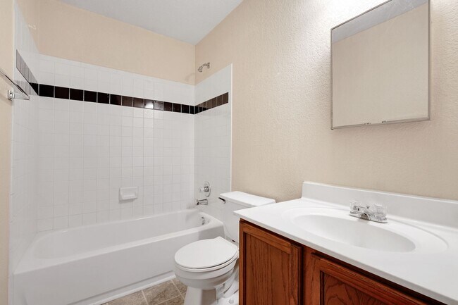 Building Photo - Spacious Brick-Front Home with Loft and Ex...