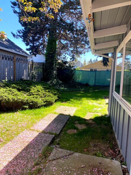 Tall Trees and landscaping in Back yard - 506 122nd St S