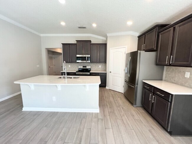 Building Photo - Introducing this stunning 4-bedroom, 2-bat...