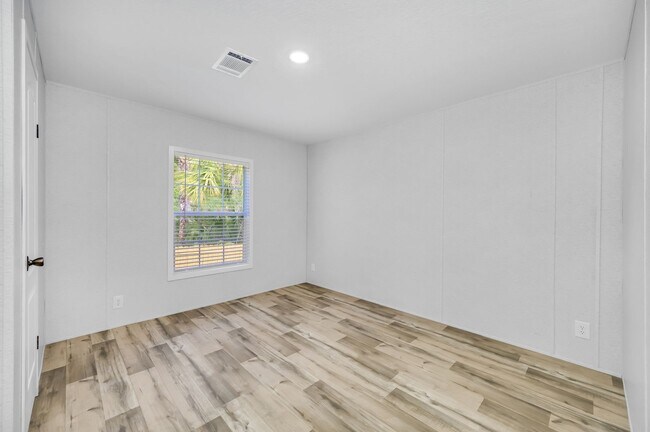 Building Photo - Experience exceptional living at its finest