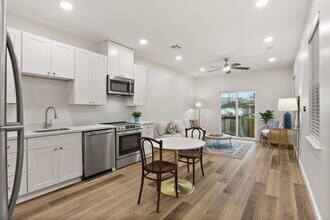 Building Photo - Newly renovated 2BD/2.5BA w/Covered Lit Parking and Private Backyard