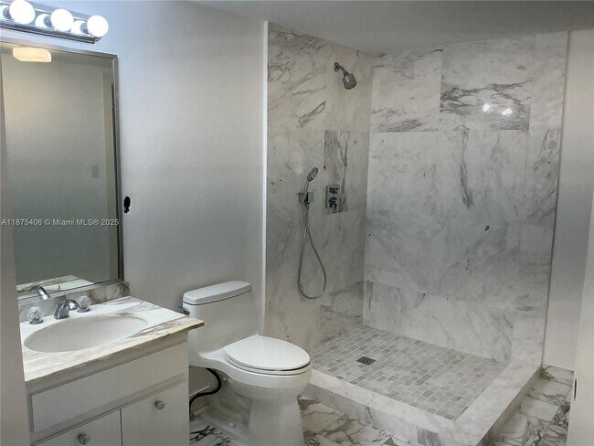 Building Photo - 10155 Collins Ave