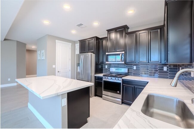 Building Photo - Fully furnished 3 bedroom / 3 bathroom plus an office.