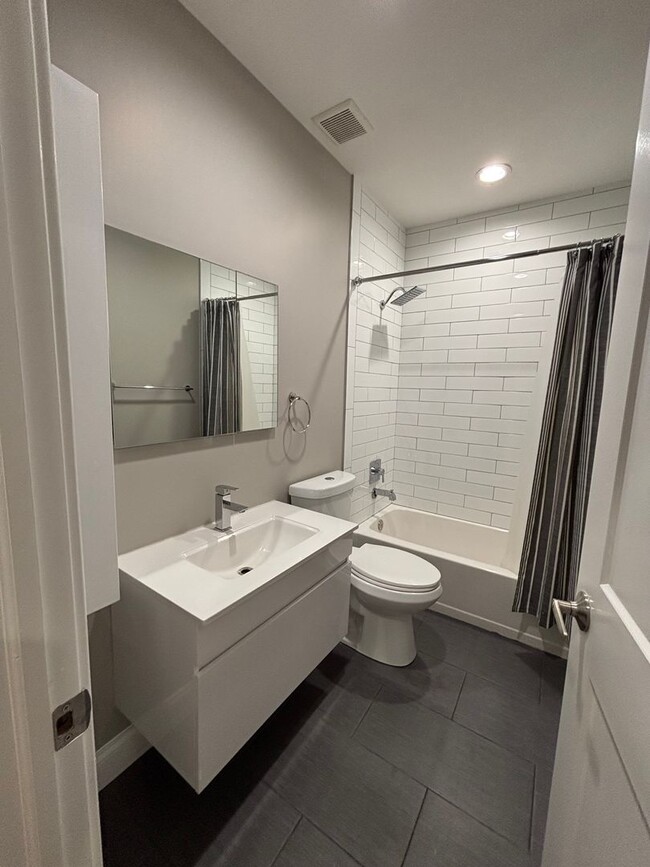 Building Photo - Gorgeous 4 Bedroom house with Three Roof-D...