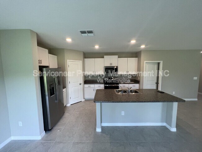 Building Photo - 12032 MIracle Mile Dr