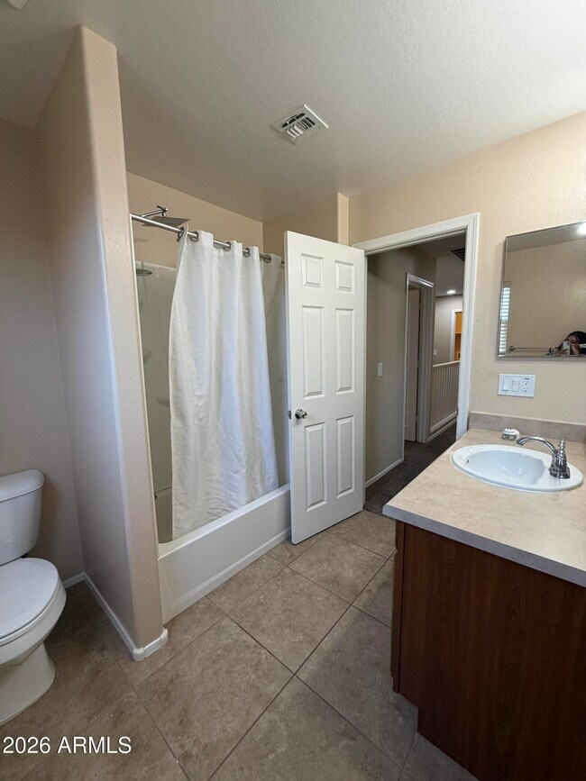 Building Photo - 4723 W Gelding Dr