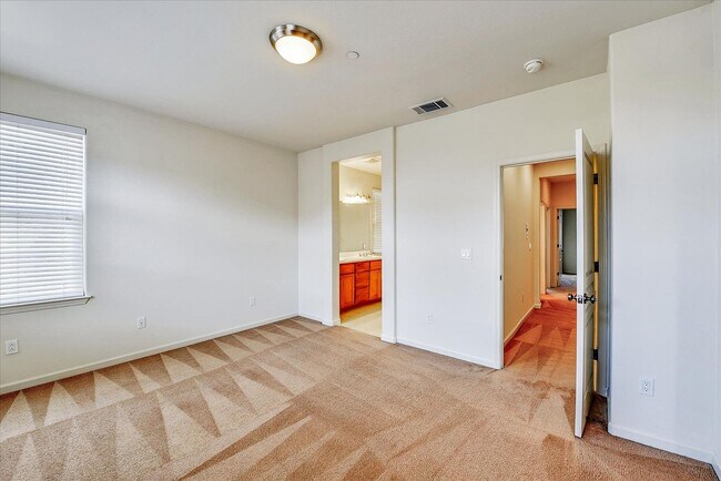 Building Photo - PRIME CORNER HOME NEAR TRAILS LIGHT-FILLED...