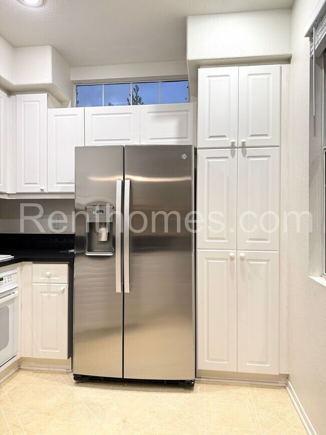 Building Photo - 10728-242 Sabre Hill Drive