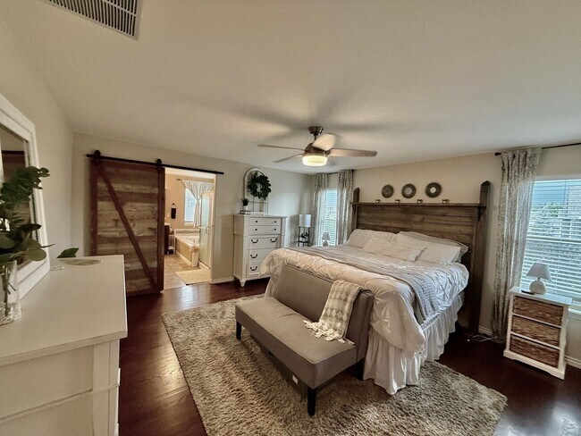 Building Photo - Spacious & Stylish 5-Bedroom Home in Wolf ...