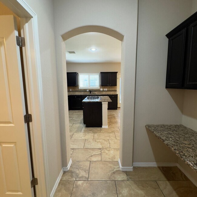 Building Photo - 4 Bedrooms, 3 Baths, a Pool, and Solar Panels!