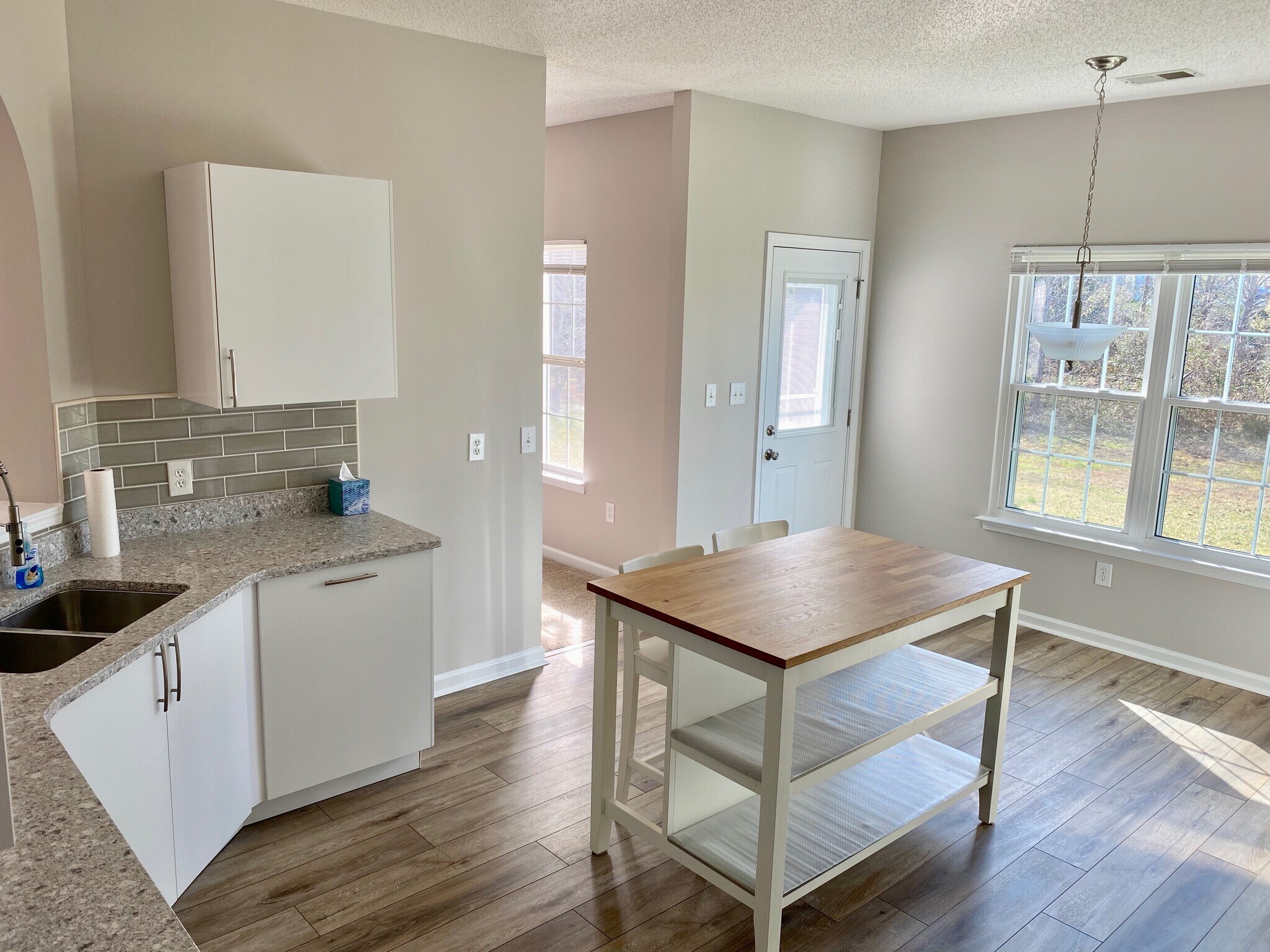 Kitchen island included and direct access to backyard patio! - 1914 Conifer Cir