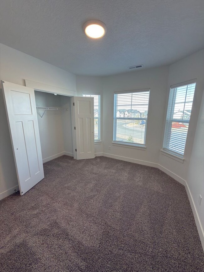 Building Photo - Brand New 3 Bed Condo with Resort-Style Amenities & Included Internet!