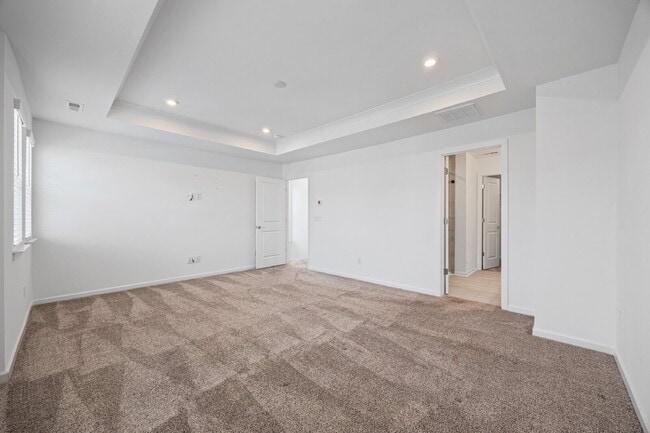 Building Photo - Spacious 3BR Townhome with Garage, Open Layout & Community Pool – Move-In Ready!