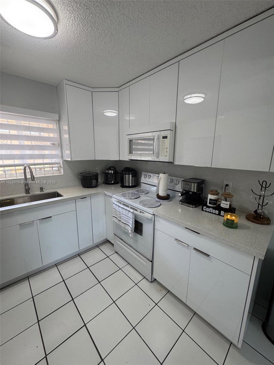 Building Photo - 7965 W 30th Ct