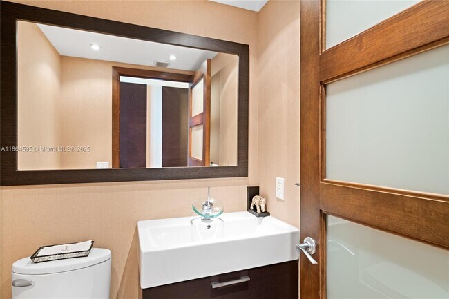 Building Photo - 5875 Collins Ave