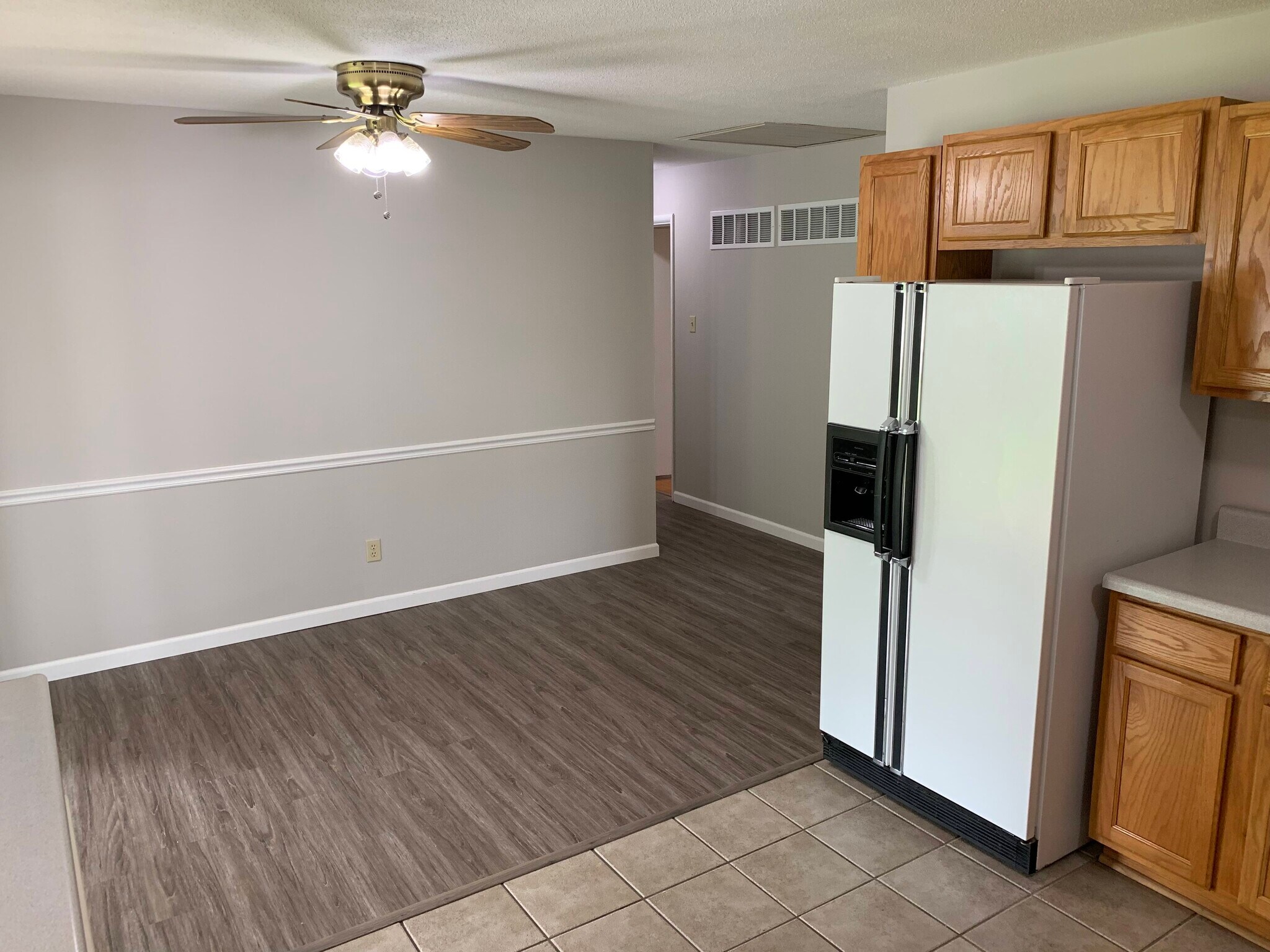 Dining room, hall, new vinyl plank floors, wall paint on 1st level - 11934 Holly Brook Dr