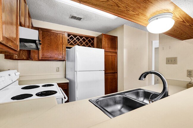 Building Photo - Stylish Two-Story Condo in the Heart of th...