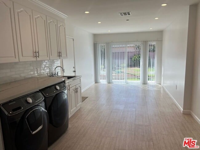 Building Photo - 6043 S Garth Ave