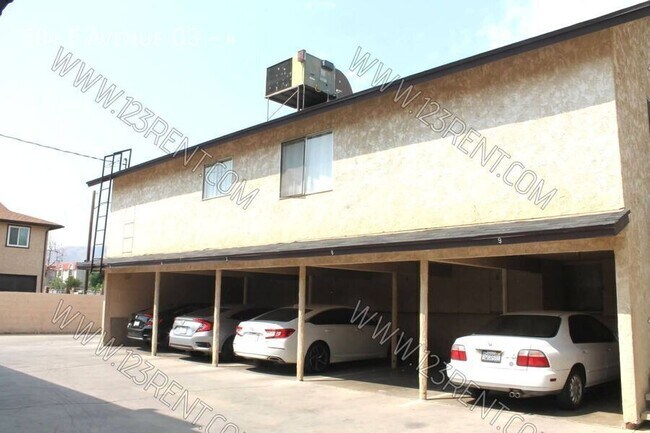 Building Photo - 504 E Ave Q3