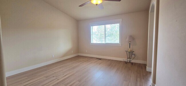 Building Photo - THREE-CAR GARAGE! This charming home offers 3 bedrooms, plus an office/rec room, and 2 bathrooms.