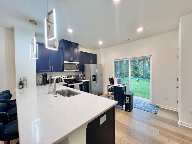 Building Photo - **OFFERING REFUNDABLE APPLICATION FEES** Luxurious, Newly Built 3BD, 2.5BA Raleigh Townhome with ...