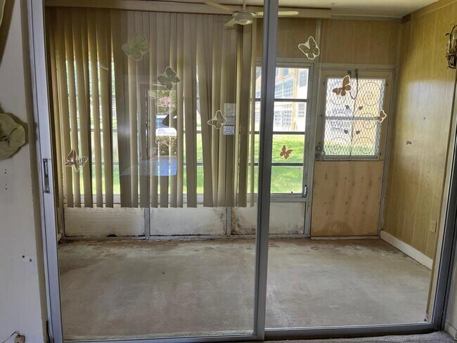 Building Photo - 6001 NW 61st Ave