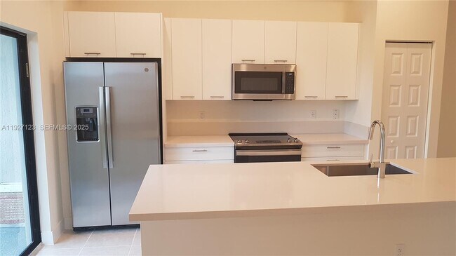 Building Photo - 8195 NW 104th Ave