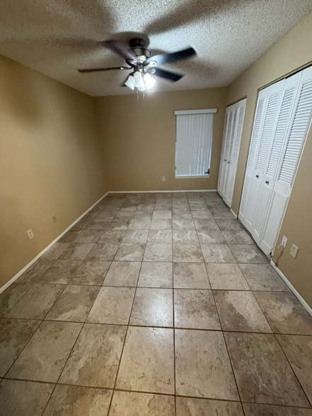 Building Photo - 3999 NW Cinnamon Tree Cir