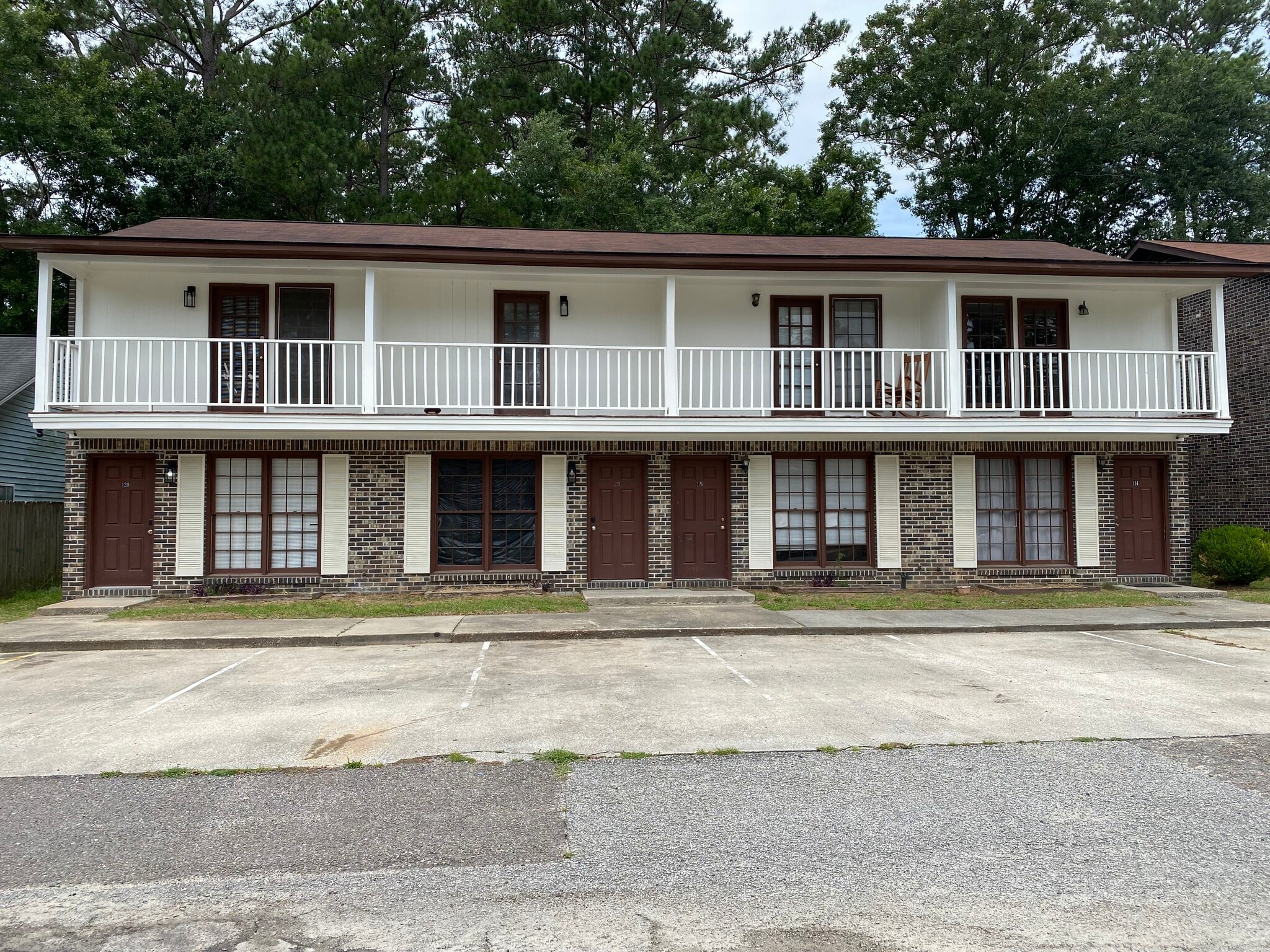 Beautifully maintained brick building with 2 dedicated parking spaces for each unit - 114 Colonial Ct