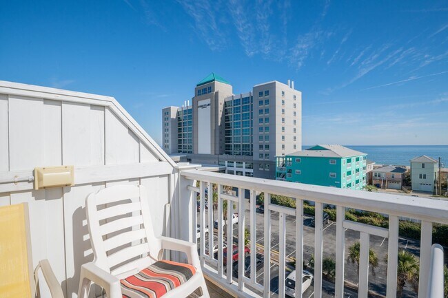 Building Photo - ENJOY OCEAN BREEZES FROM THIS FURNISHED OFF-SEASON OCEAN VIEW CONDO W/BALCONIES