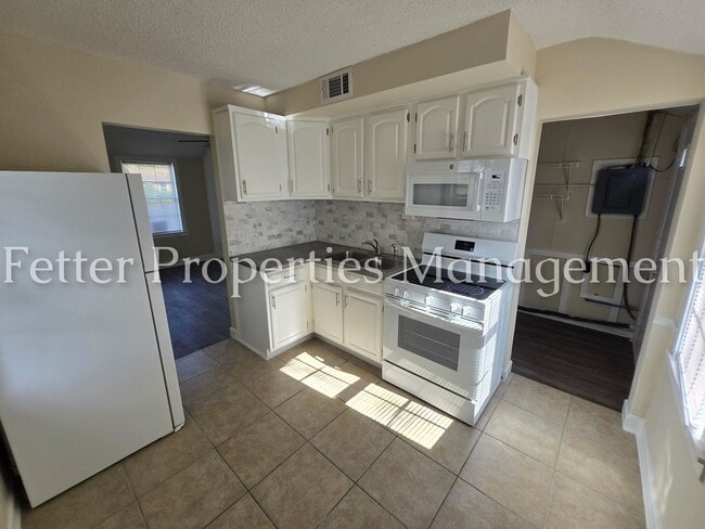 Building Photo - Summer Special! First Month's Rent Free!