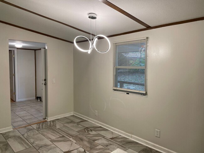 Building Photo - Updated Two Bedroom Trailer with Lake Acce...