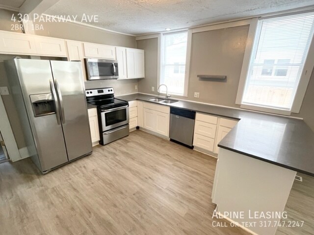 Building Photo - 2 Bedroom conveniently located in thriving...