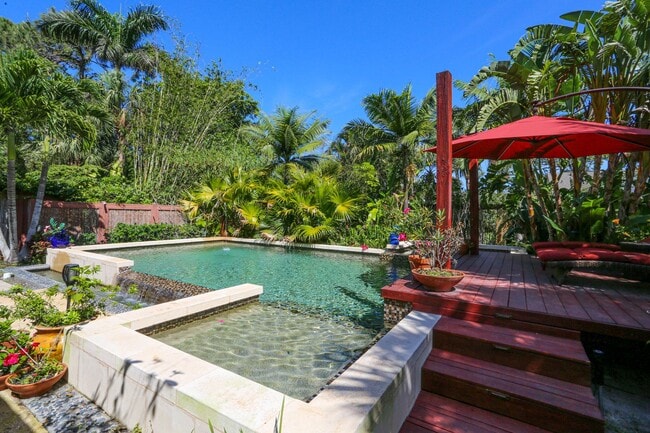 Building Photo - **TROPICAL PARADISE**3BEDS/2BATH POOL HOME...