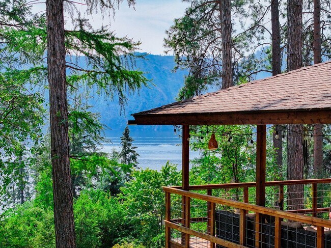 Building Photo - 2700 + sq ft family home has it all! Over 2 acres of land and a stunning view of Lake Pend Oreille
