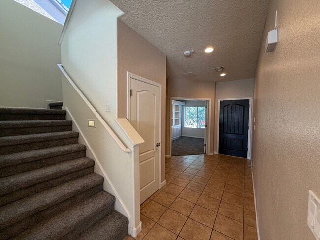 Building Photo - 4 Bedroom + Office Home Available Near Loma Colorado Blvd NE & Broadmoor Blvd NE in Rio Rancho!
