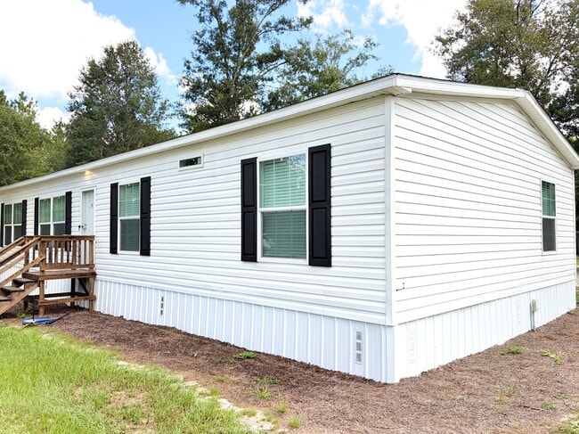 Building Photo - 5250 Hummingbird Ln