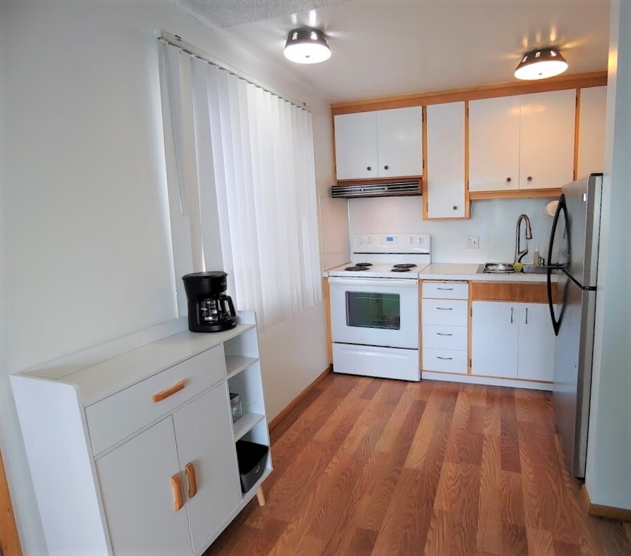 Kitchen set up with pots, pans, cooking and dining accessories - 4215 Whitman Ave N