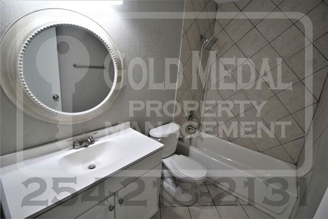 Building Photo - A charming 2-bedroom, 1.5-bathroom townhome now available for rent!