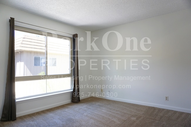 Building Photo - Well-Maintained 2-Bedroom Condo | Garage +...