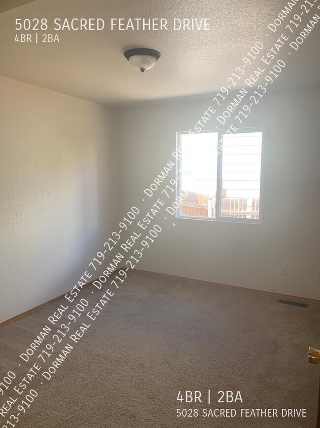 Building Photo - 5028 Sacred Feather Dr