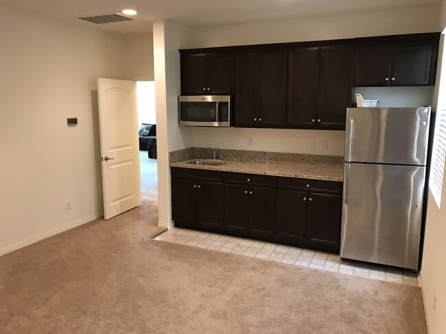 Building Photo - Private large 4 bed NextGen, with double living rooms, kitchens and laundries.