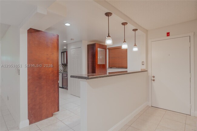 Building Photo - 2700 Coral Springs Dr