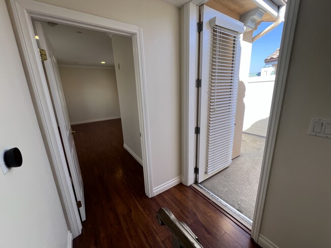 A door opening to a back patio on the 3rd floor - 430 W Wilson Ave